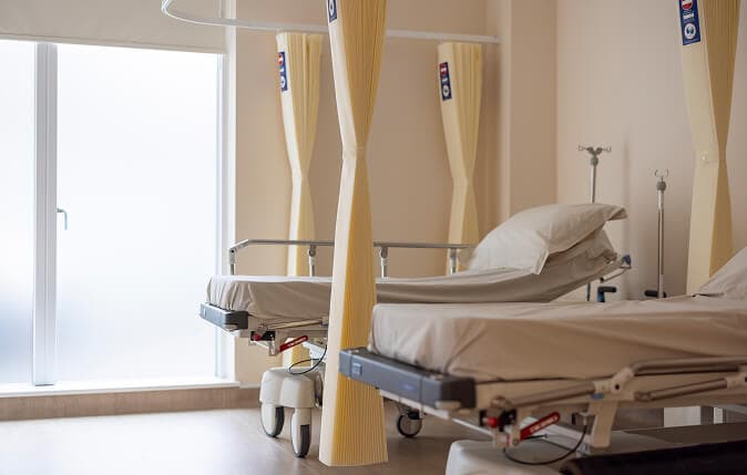 Day care unit for patient monitoring and IV therapies